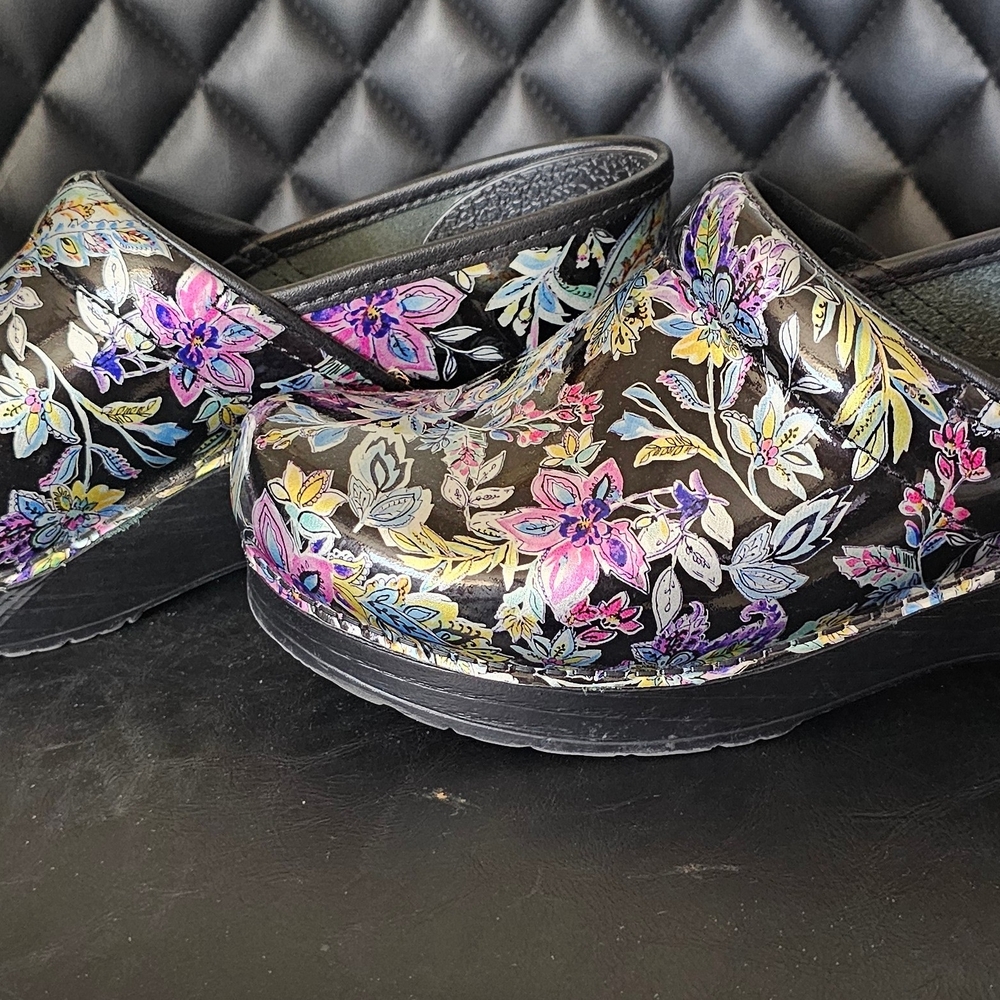 Dansko Black Floral Women's Clogs